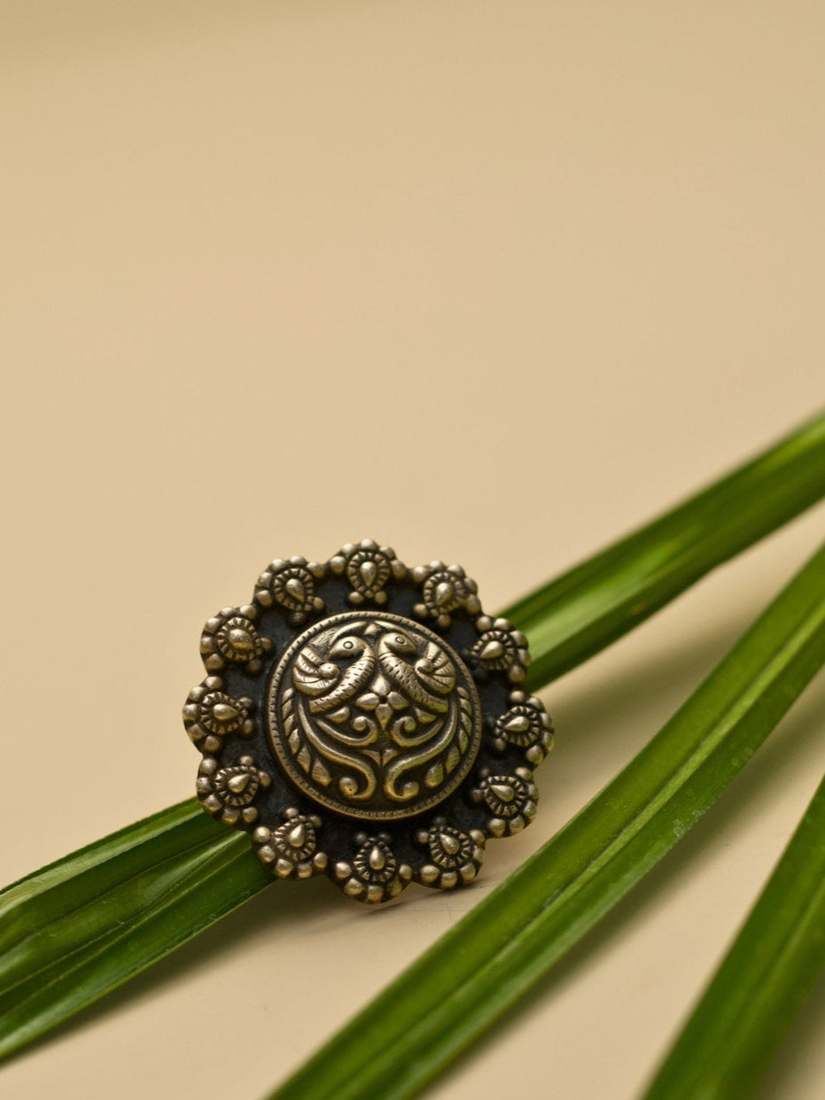 Shubhra Ring by Naksa—oxidized 925 silver statement ring with central carving and beaded floral border, inspired by temple motifs.