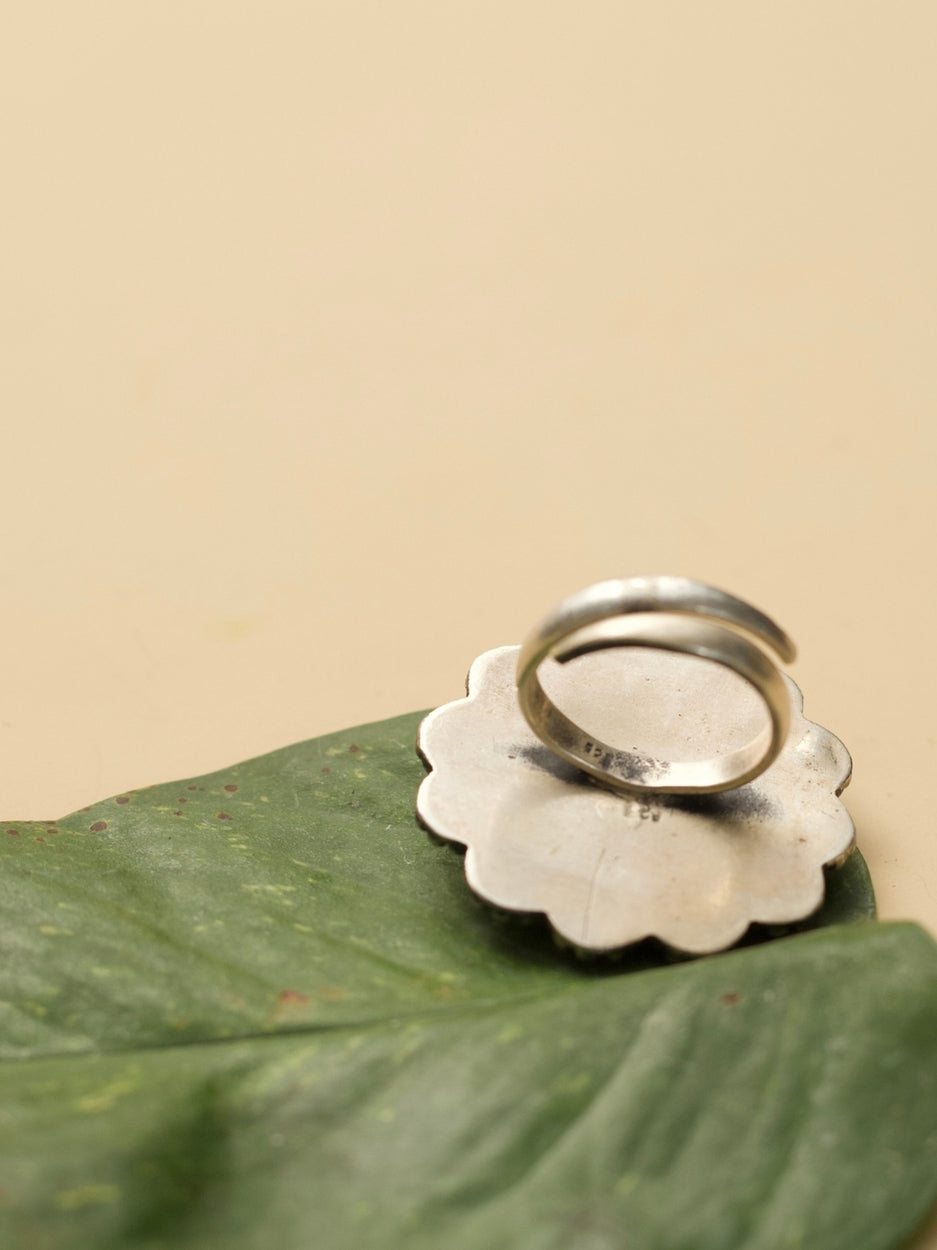 Shubhra Ring by Naksa—oxidized 925 silver statement ring with central carving and beaded floral border, inspired by temple motifs.