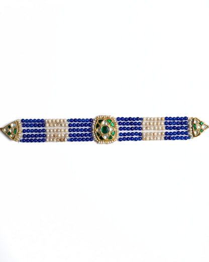 Blue and pearl striped choker in 925 silver with gold polish and kundan-set green centre stone by Naksa