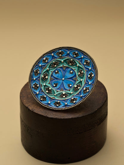 Whirling Sky Enamel Ring by Naksa—oversized 925 silver statement ring with blue meenakari mandala, convertible as pendant or brooch.