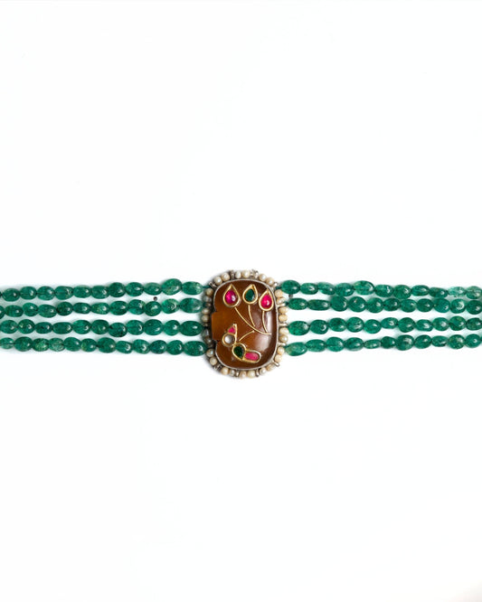 Four-strand green beaded 925 silver choker with gold-polished oval centre, pearl border and pink-green bird motif detailing.
