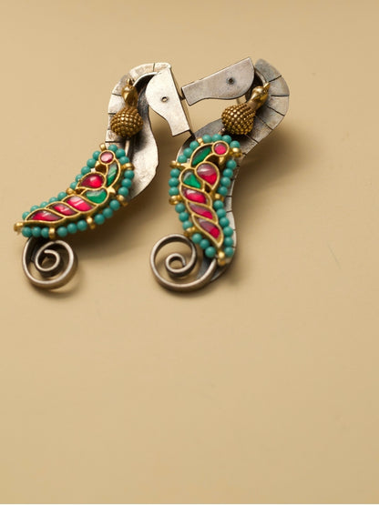 The Adorned Sea Horse Earrings by Naksa—oxidized 925 silver with bead detailing in pink, green, and turquoise.