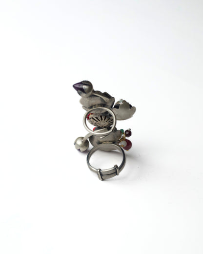 Back view of Ruby Gardenia Ascend Full Finger Ring in 925 silver, highlighting the adjustable full-finger band, smooth silver finish, and structural support connecting the layered motifs.