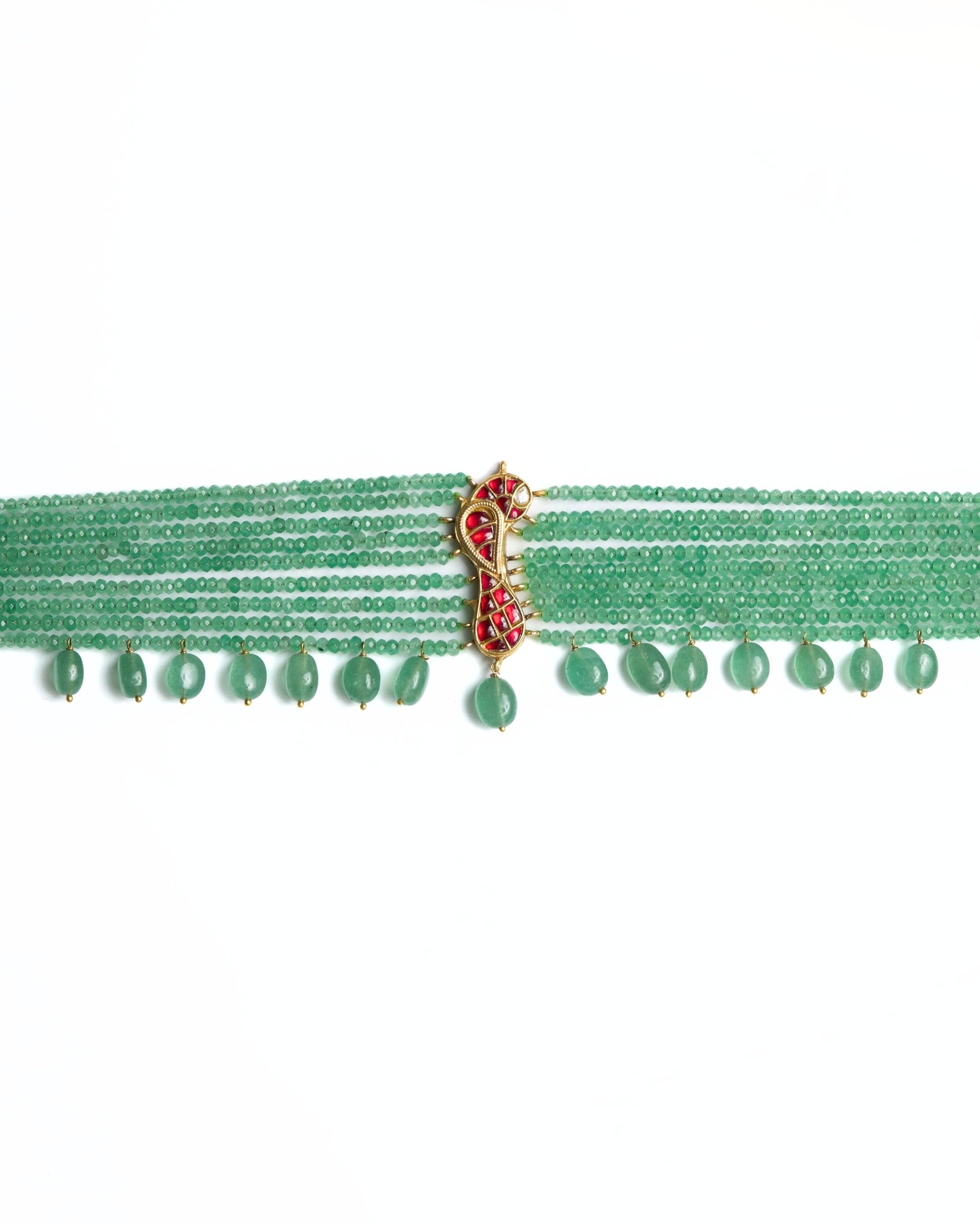 Green multi-strand beaded 925 silver choker with gold polish, red kundan-style bird motif at centre, and dangling green stone drops along the base.