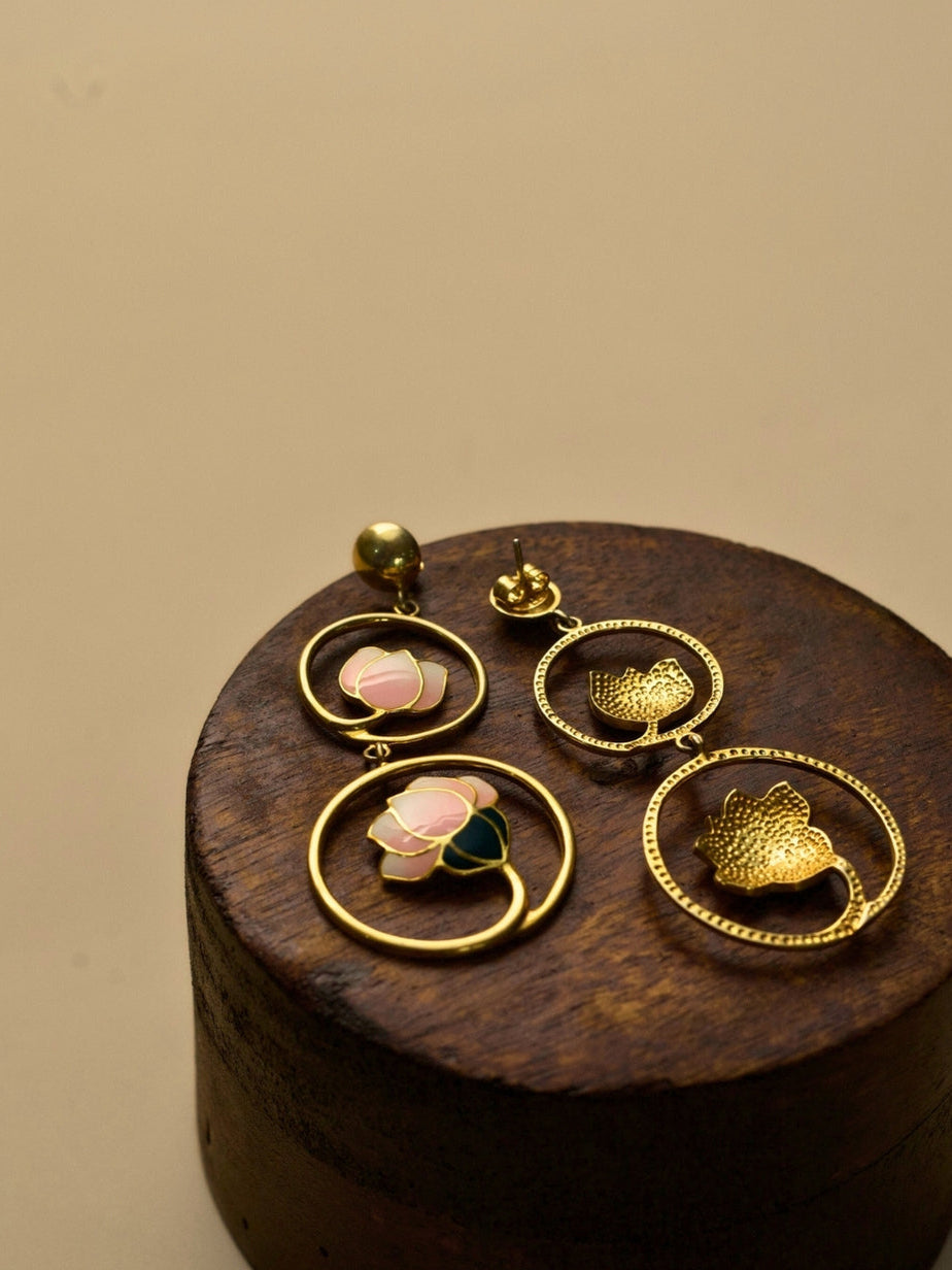 Lotus Affairs Earrings by Naksa—gold polished 925 silver earrings with blush pink and green enamel lotuses in double hoop design.