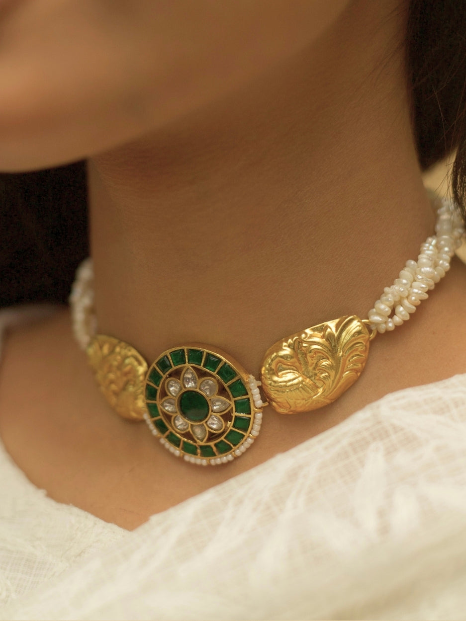 Green kundan peacock choker set with floral center and pearls, handcrafted in gold-plated silver – Naksa Jewelry

