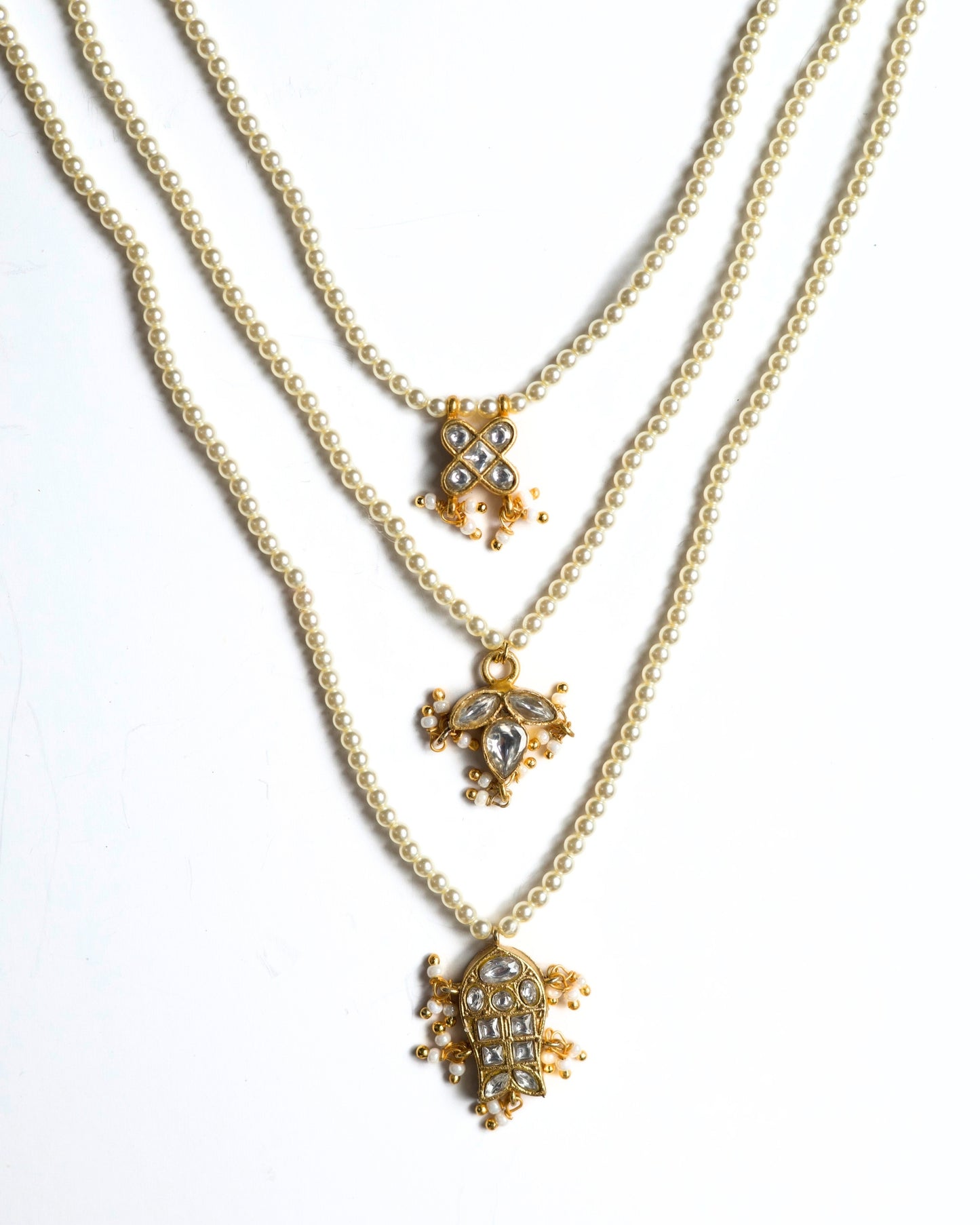 Triple-layer pearl teen lada necklace in 925 silver with kundan-style white stones and gold-toned detailing