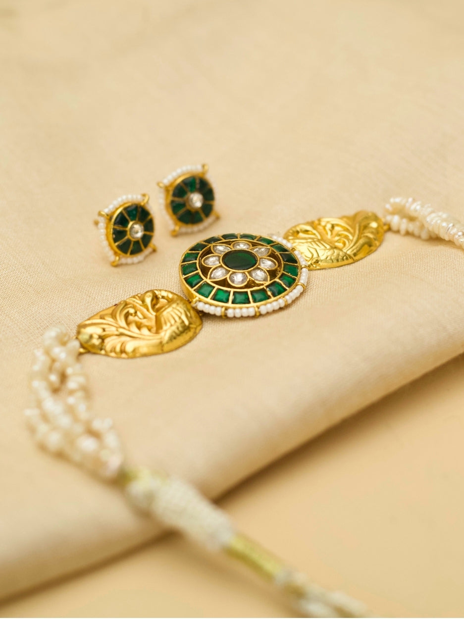 Green kundan peacock choker set with floral center and pearls, handcrafted in gold-plated silver – Naksa Jewelry

