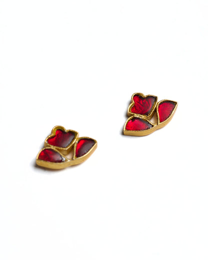 Small ruby stone stud earrings in 925 silver floral formation