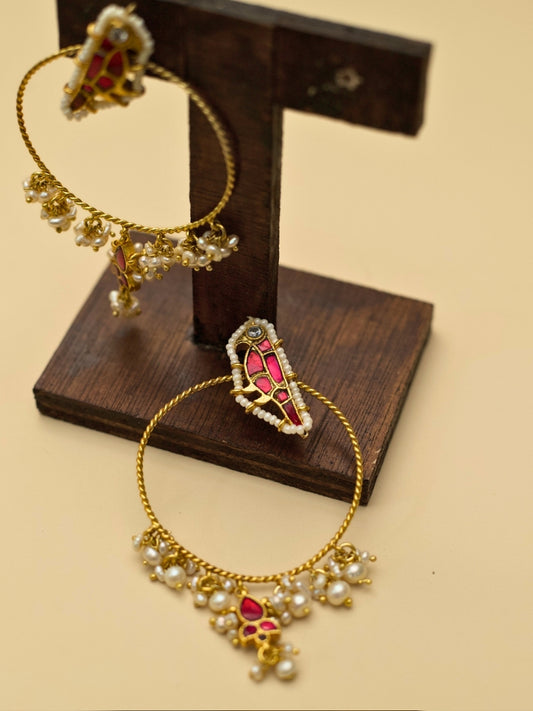 Jhoom Jhumkas by Naksa—gold polished 925 silver hoop earrings with red kundan drops, pearl fringe, and twisted wire design.