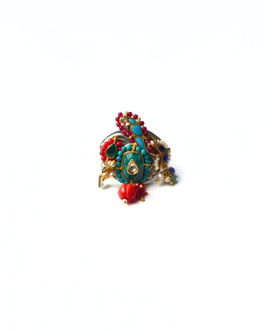 Aqua Birdcourt Ring in 925 silver with aqua centre stone, blue bird motif, turquoise beadwork, red accents, and clustered detailing