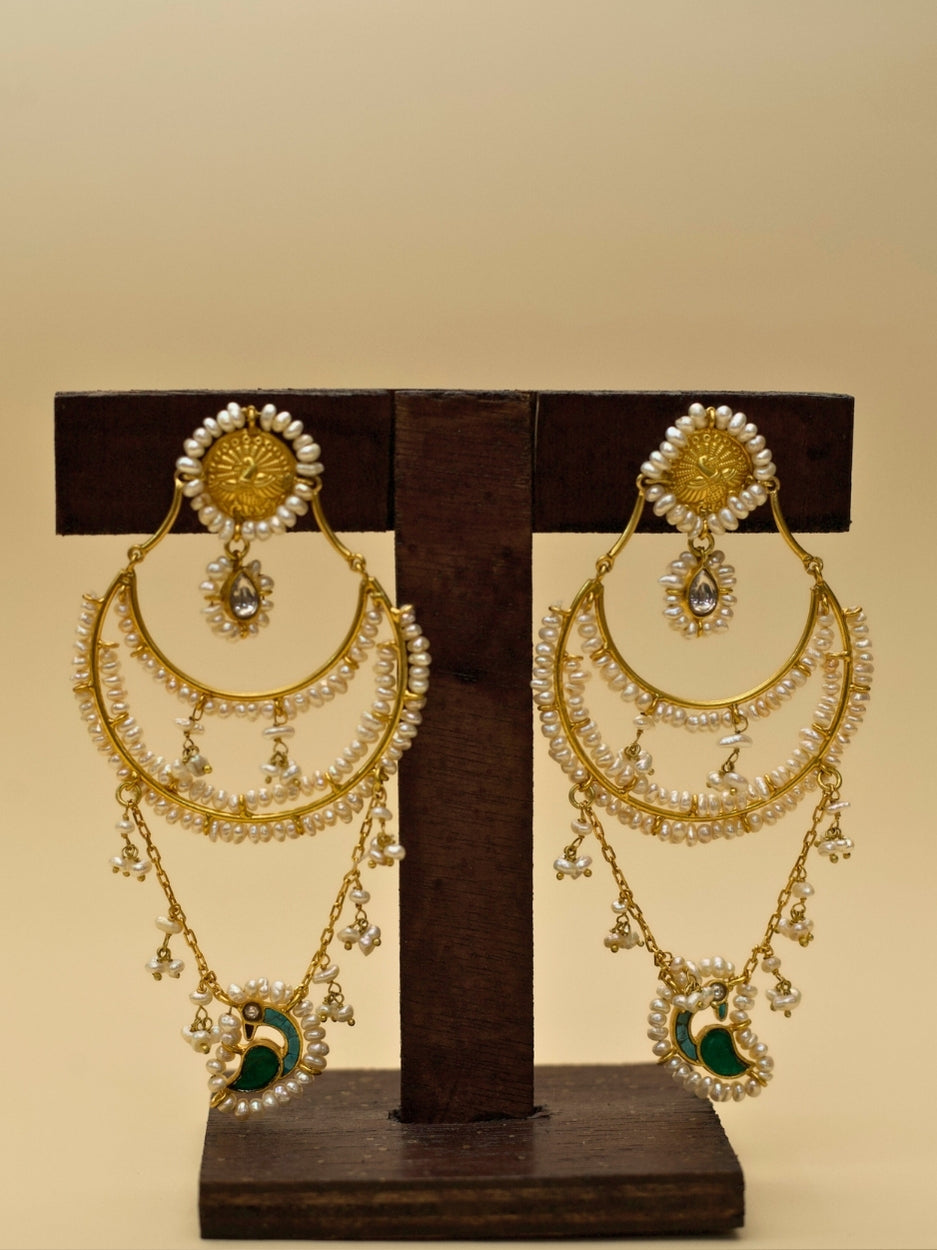 Chaand Re Jhumkas by Naksa—gold polished 925 silver earrings with layered pearl chains, green crescent drop, and faceted teardrop stone.