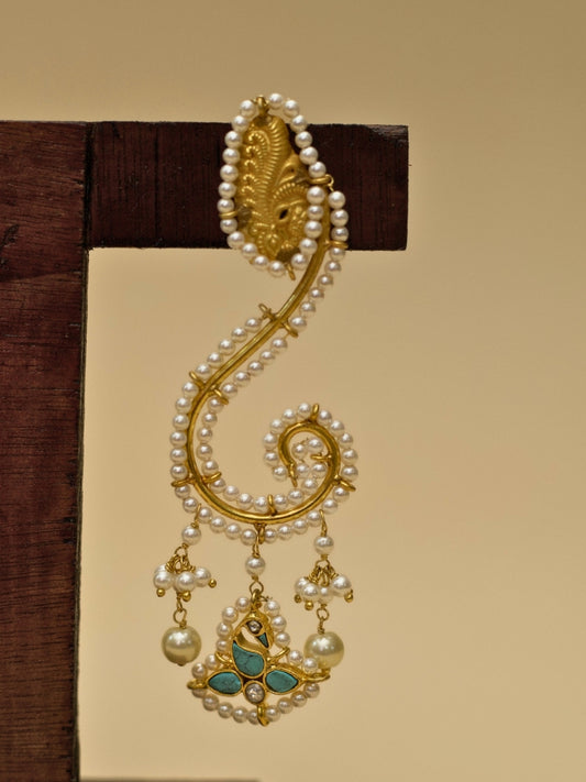 Ghunghat Jhumkas by Naksa—sculptural 925 silver earrings with pearl-lined curve, kundan bird drop, and gold polish.