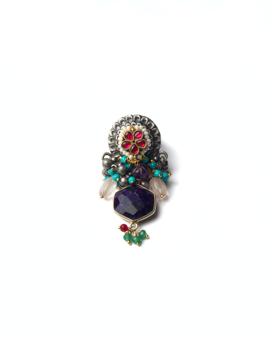 The Legacy Drop Ring in 925 silver with kundan floral crest and deep violet faceted drop in a vertical statement design