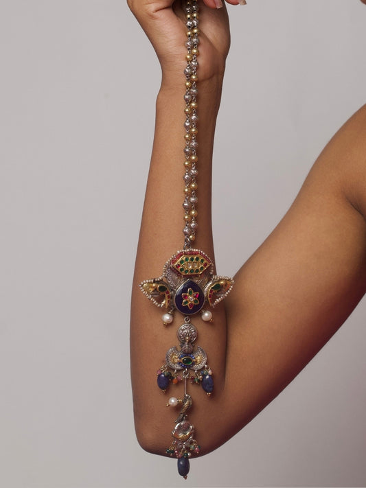925 silver necklace with elephant heads, abstract Ganesha figure, fish motif, enamel detailing, and gold accents.