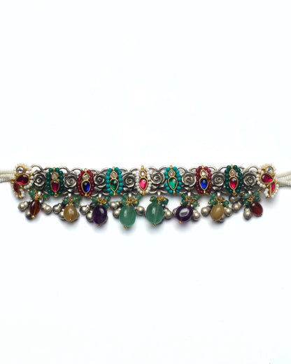 Oxidised silver floral choker with kundan teardrop stones and carved stone drops in honey quartz, plum amethyst, and moss green aventurine