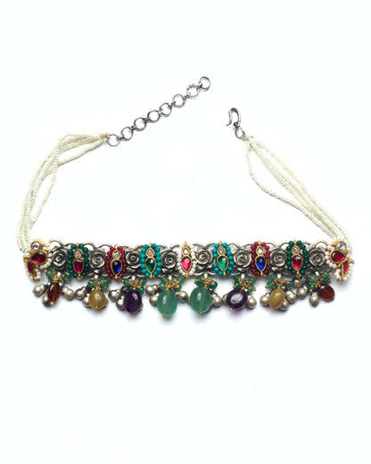Handcrafted oxidised silver choker showing clustered floral construction and intricate kundan stone setting