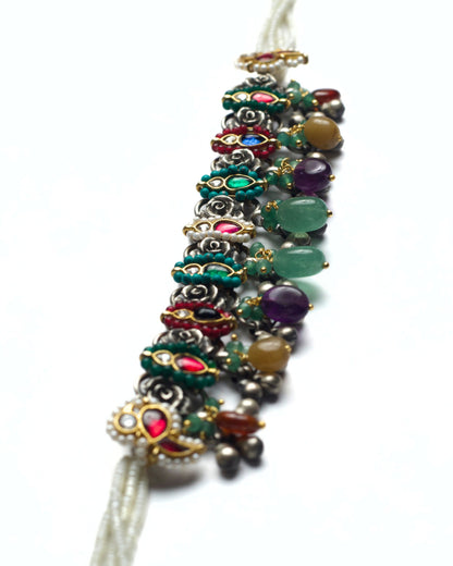 Stone drops in honey quartz, plum amethyst, and moss green aventurine suspended from oxidised silver choker
