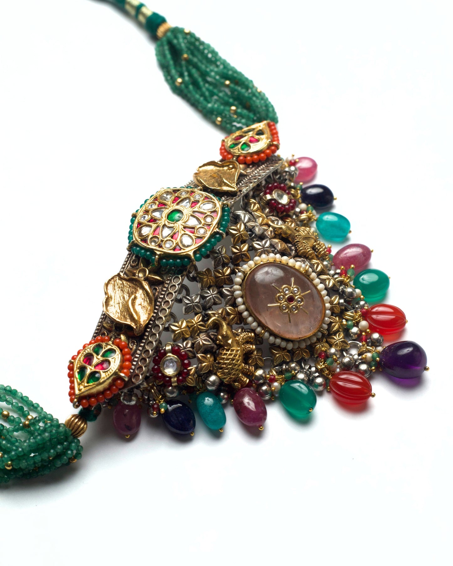 Side detail of choker featuring elephant motifs and hand-set stones