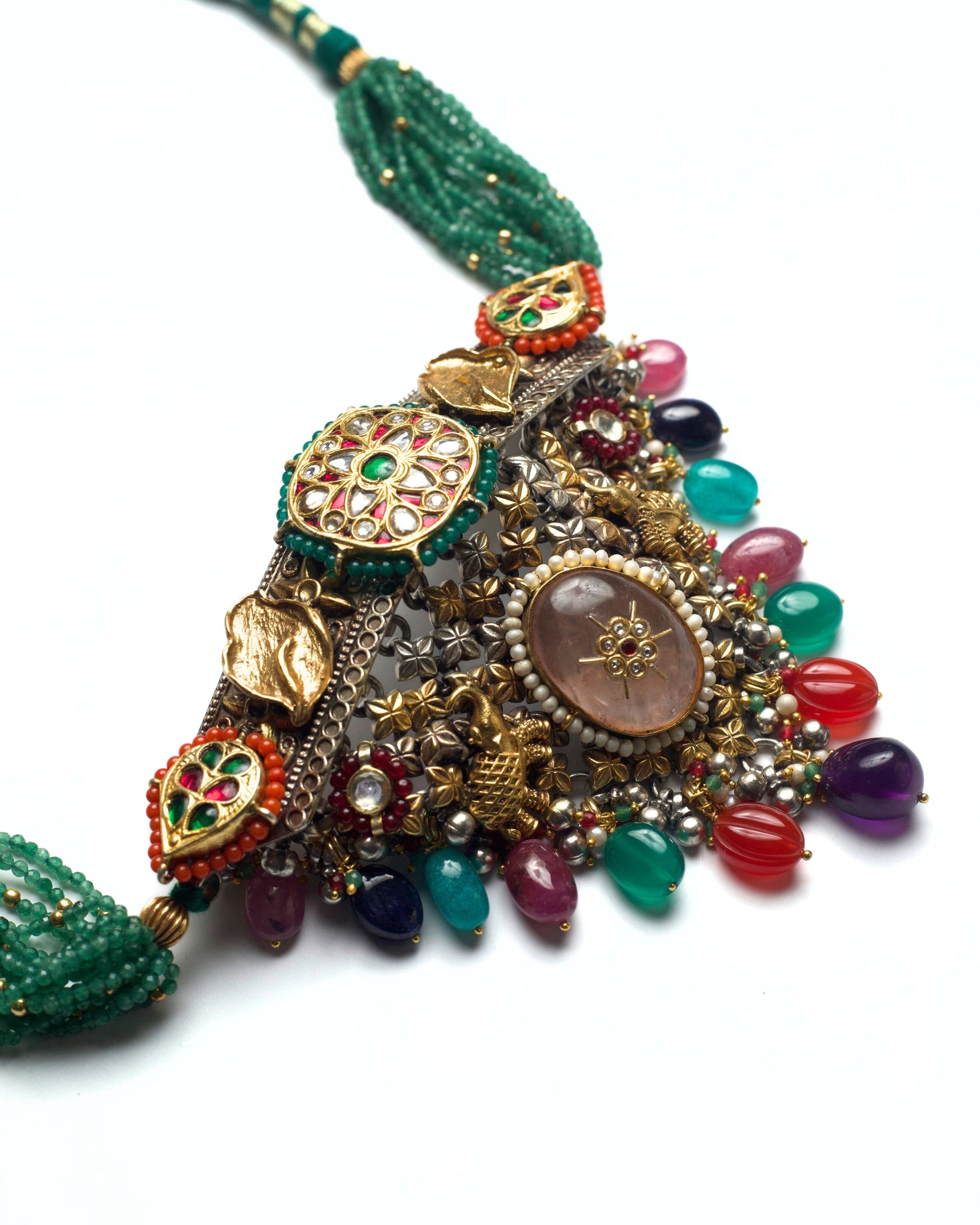Side detail of choker featuring elephant motifs and hand-set stones