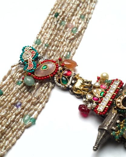 Statement pearl choker with parrot detailing and turquoise accents