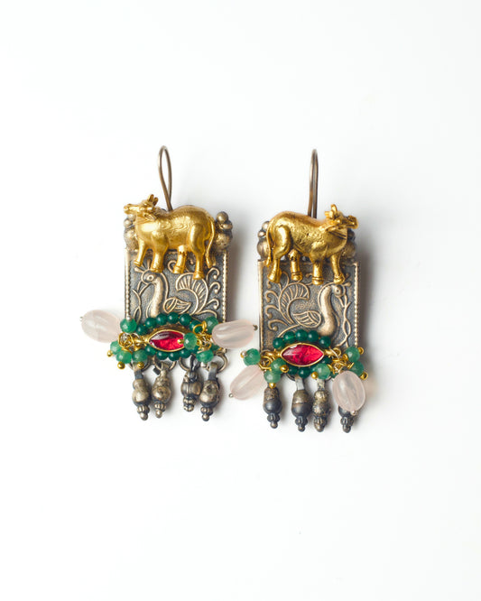 925 silver Nandi panel earrings with peacock carving and ghunghroo drops by Naksa