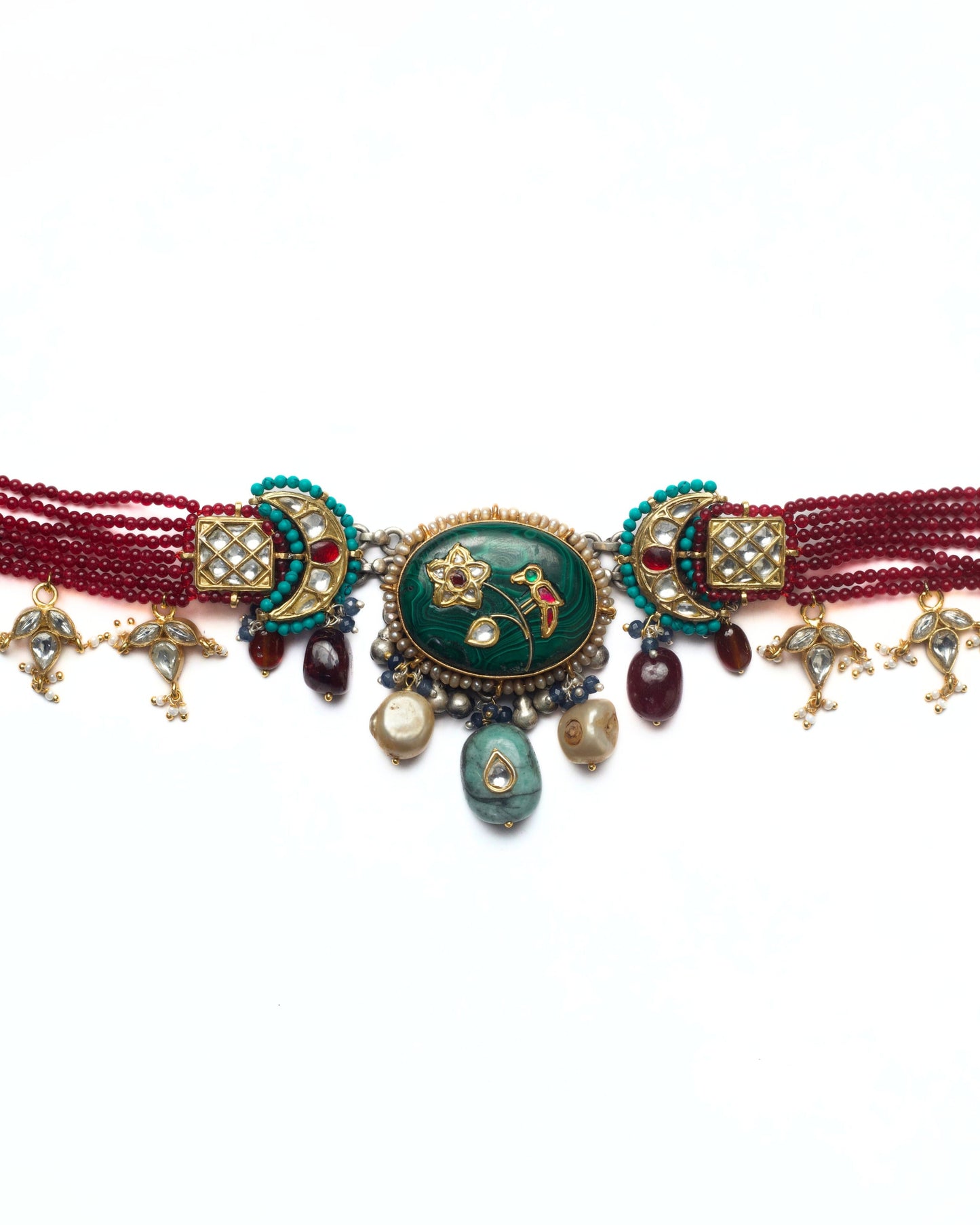 Handcrafted kundan choker featuring crescent moon details, square grid settings and green stone centre