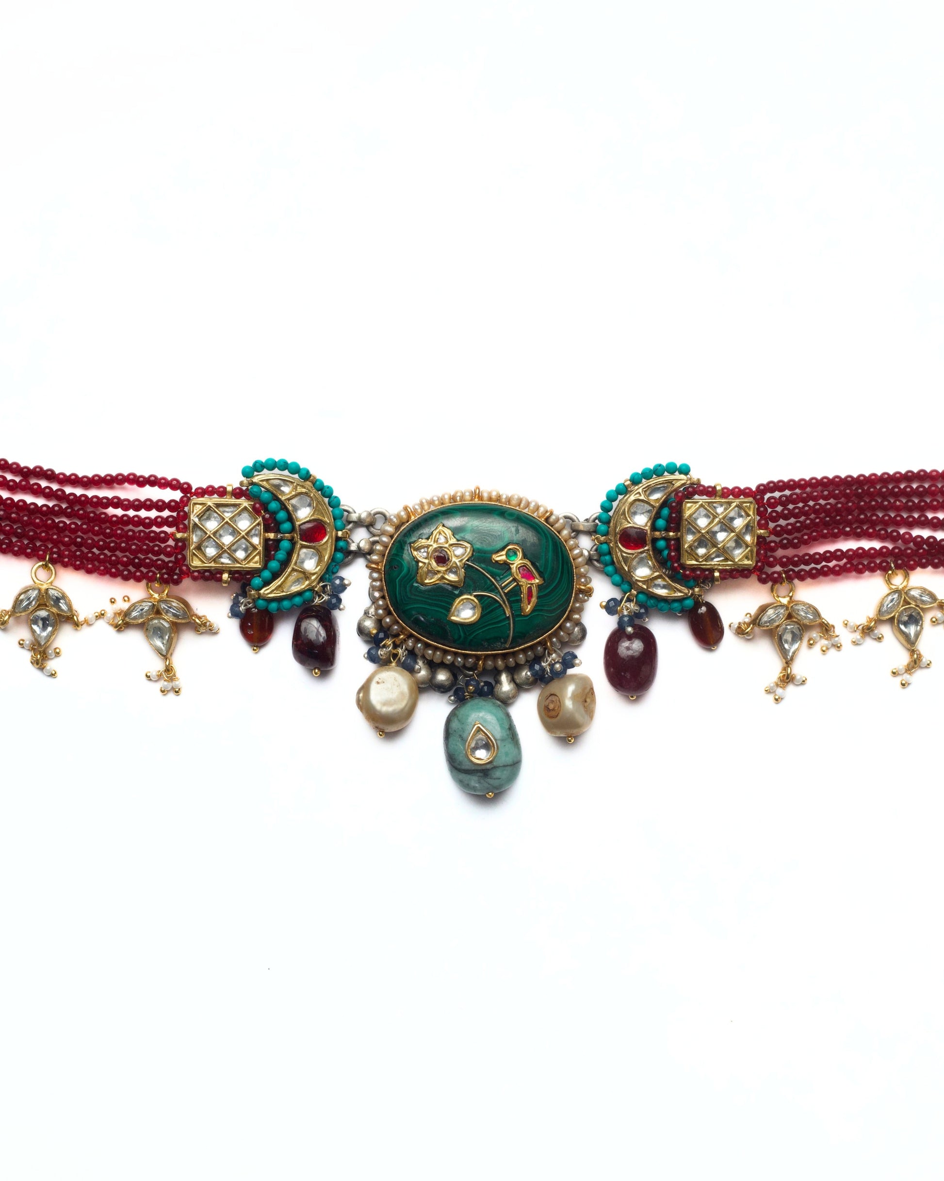 Handcrafted kundan choker featuring crescent moon details, square grid settings and green stone centre