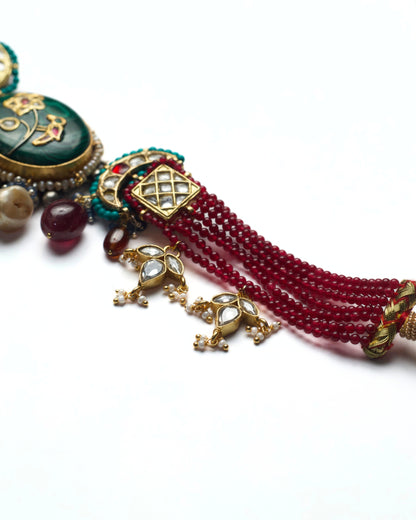 Statement silver choker with red beading, crescent motifs, kundan work and pearl stone drops