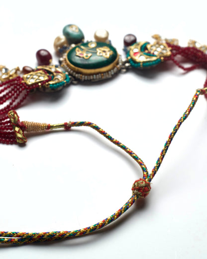 Artisan silver kundan choker with green bird motif centre, turquoise accents and layered drops