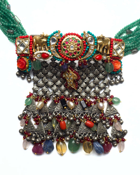 Handcrafted fusion choker with floral kundan centre, parrot motifs, oxidised lattice panel, fish kundan detail, and layered triangular drops with multicoloured stones