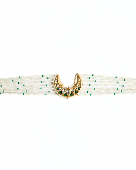 Pearl choker with emerald green bead detailing and crescent kundan-style centre in 925 silver