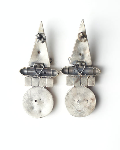 Back of red stone silver earrings with elephant detailing