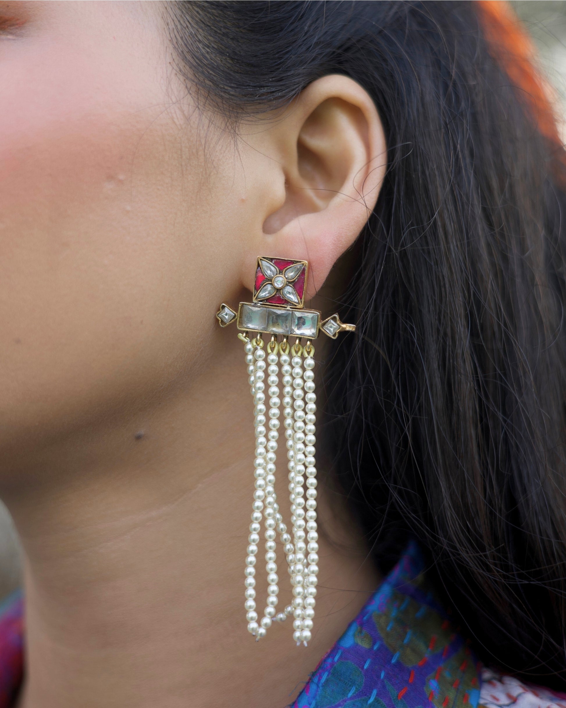 Playful long pearl drop earrings with kundan-style setting
