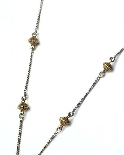 Fine silver chain with gold-toned accents on Parrot Arc Chain Necklace