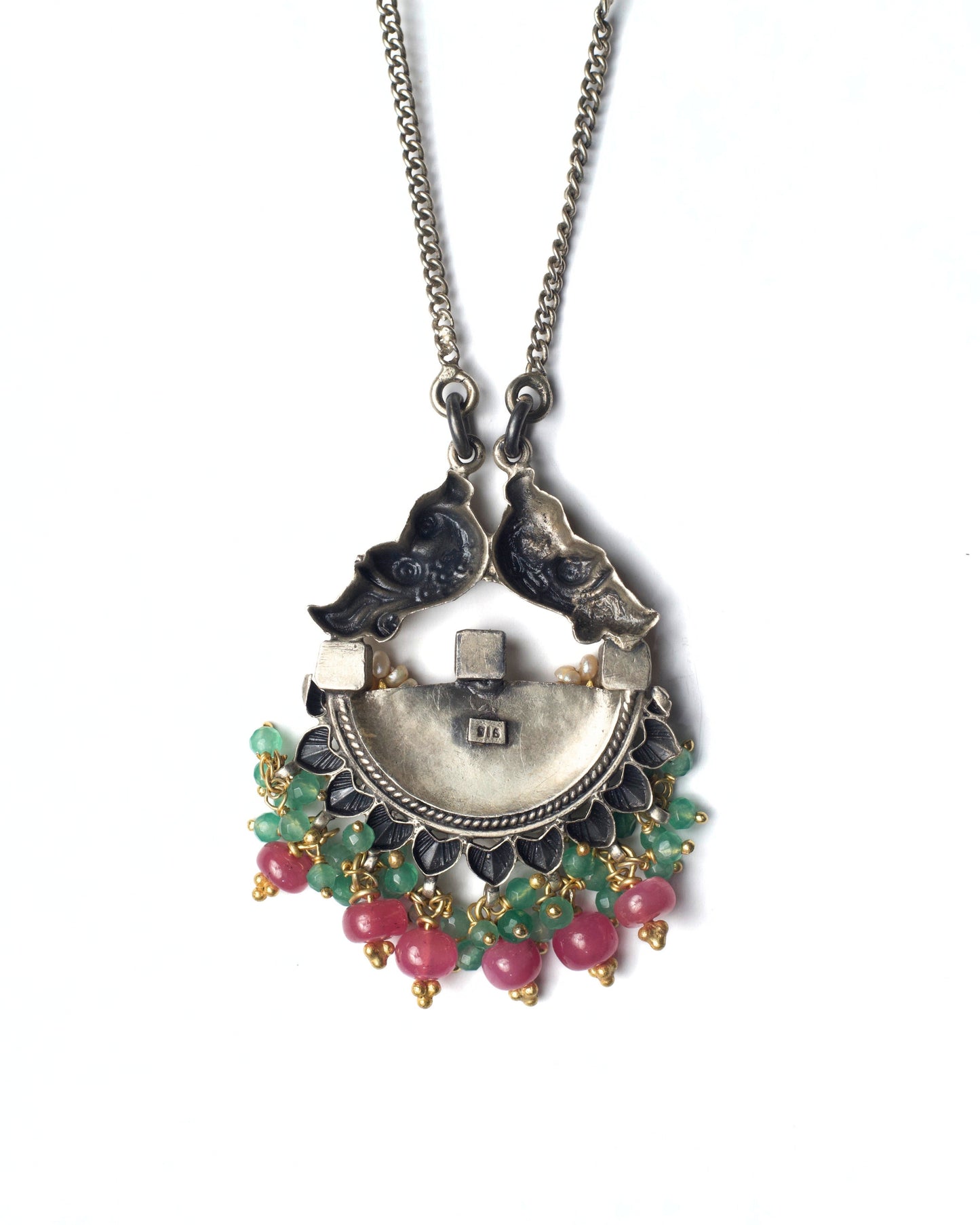 Back of parrot motif and curved kundan stone arc with gemstone drops in silver necklace