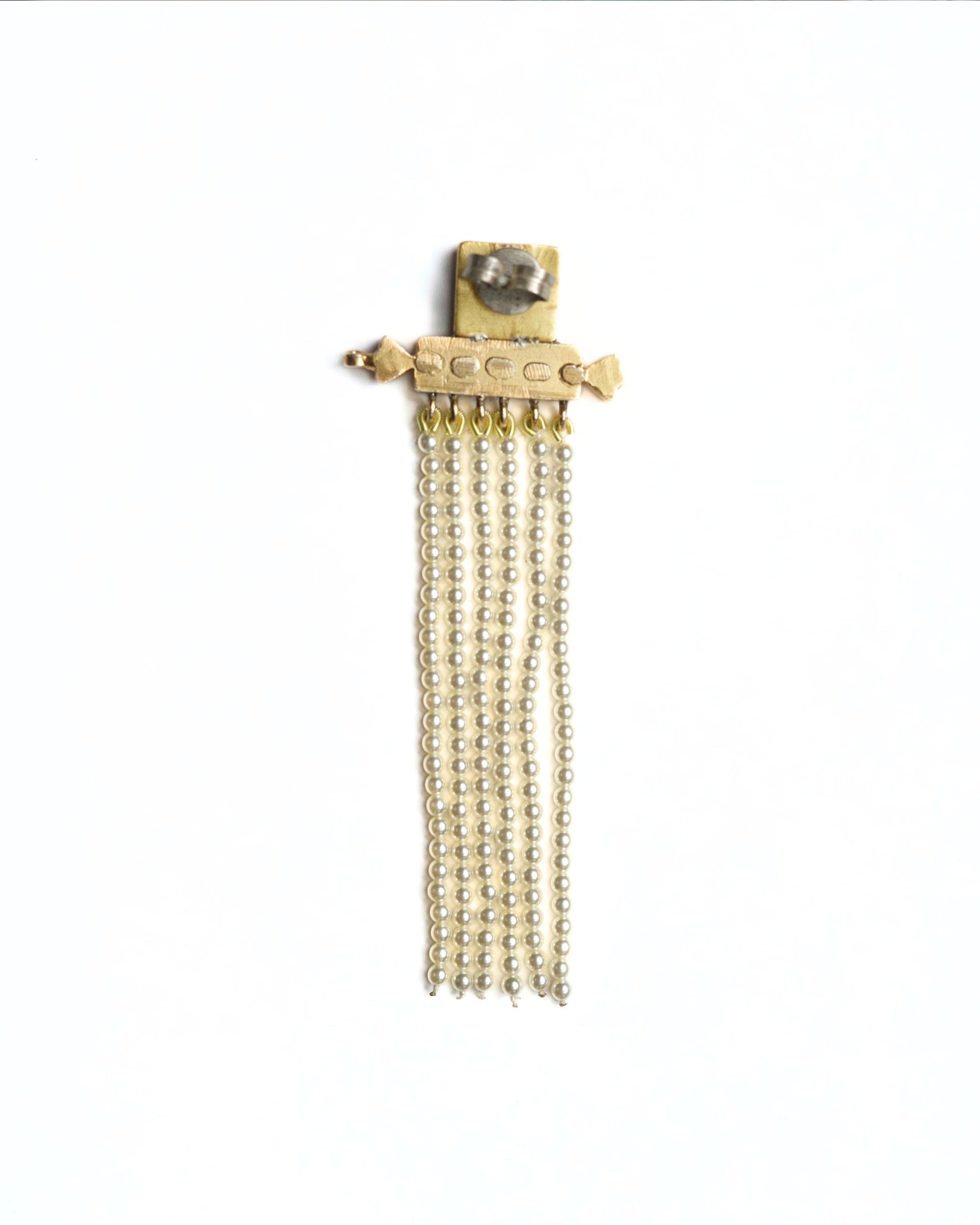 Gold-polished silver earrings with ruby detail and layered pearl chains