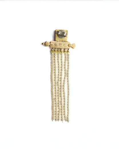 Gold-polished silver earrings with ruby detail and layered pearl chains