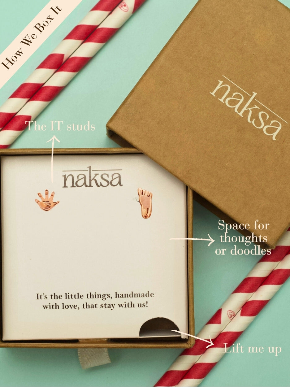 The First Impressions Studs by Naksa—mismatched hand and foot earrings in rose gold polished 925 silver, perfect for baby showers and newborn gifting.