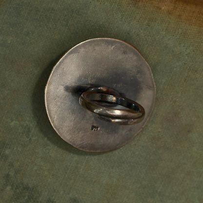 Literature and jewellery have the power to alter lives. Express your unyielding spirit with our pure oxidised silver ring with a spiral engraved pattern symbolising the ripples of hope in stagnant waters. It has an adjustable pure silver band for the perfect fit which makes it an ideal everyday wear jewellery.