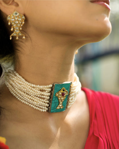 Layered pearl choker in 925 silver with turquoise rectangular centre and fish motif set with kundan-style white stones and red accent.
