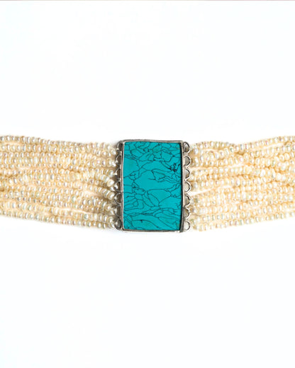 Layered pearl choker in 925 silver with turquoise rectangular centre and fish motif set with kundan-style white stones and red accent.