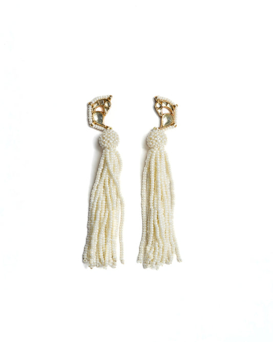 Gold-toned 925 silver bird earrings with kundan-style stones and long cascading pearl tassels.