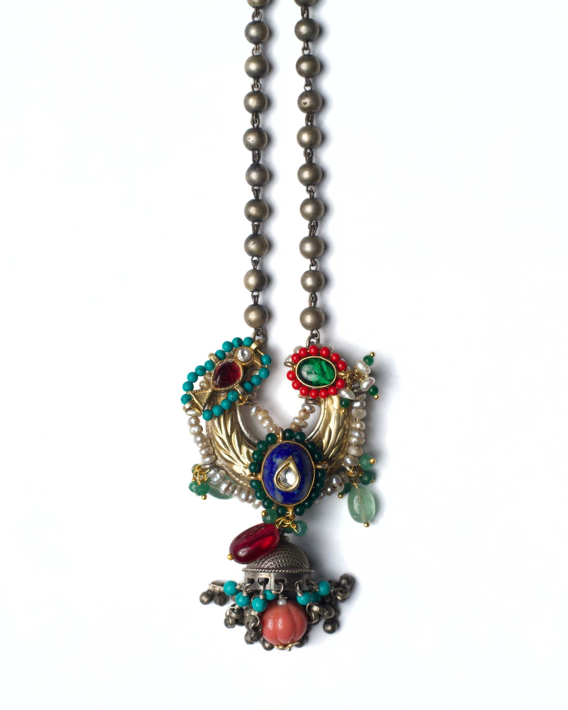 Moonward Horn Chain Necklace in 925 silver with twin horn motif, indigo center stone, kundan detailing, pearl accents, and jhumka drop