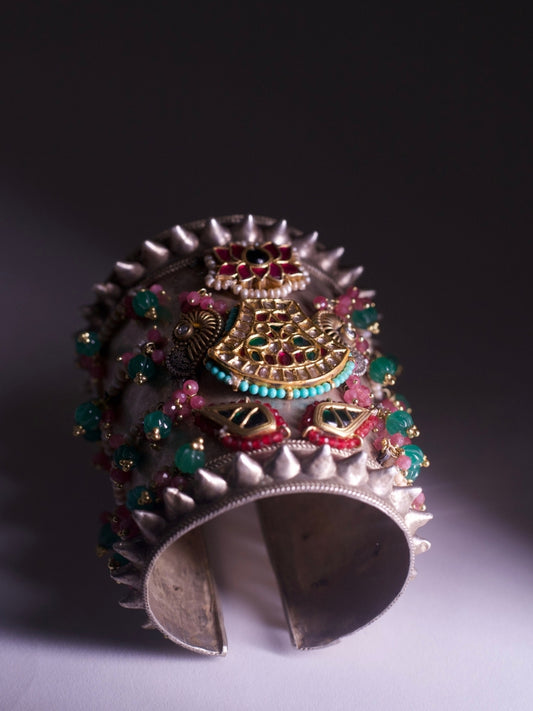 Vintage tribal fusion cuff with kundan goddess motifs, pearl-lined silhouette, and floral beadwork – Naksa Jewelry