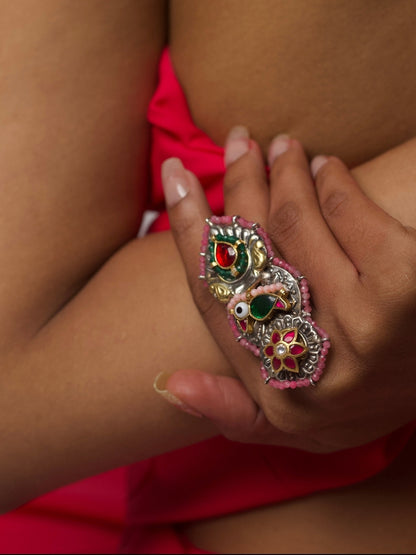 Handcrafted 92.5 silver statement ring with three vertically stacked motifs—kundan bird, temple flame, and floral medallion with pink beading – Naksa