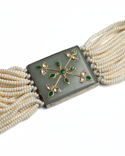 Layered pearl choker in 925 silver with pistachio green rectangular centre panel set with green and kundan-style stones, multi-strand pearl detailing.