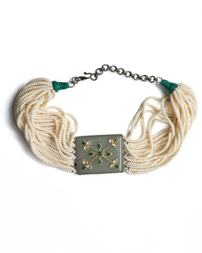 Layered pearl choker in 925 silver with pistachio green rectangular centre panel set with green and kundan-style stones, multi-strand pearl detailing.