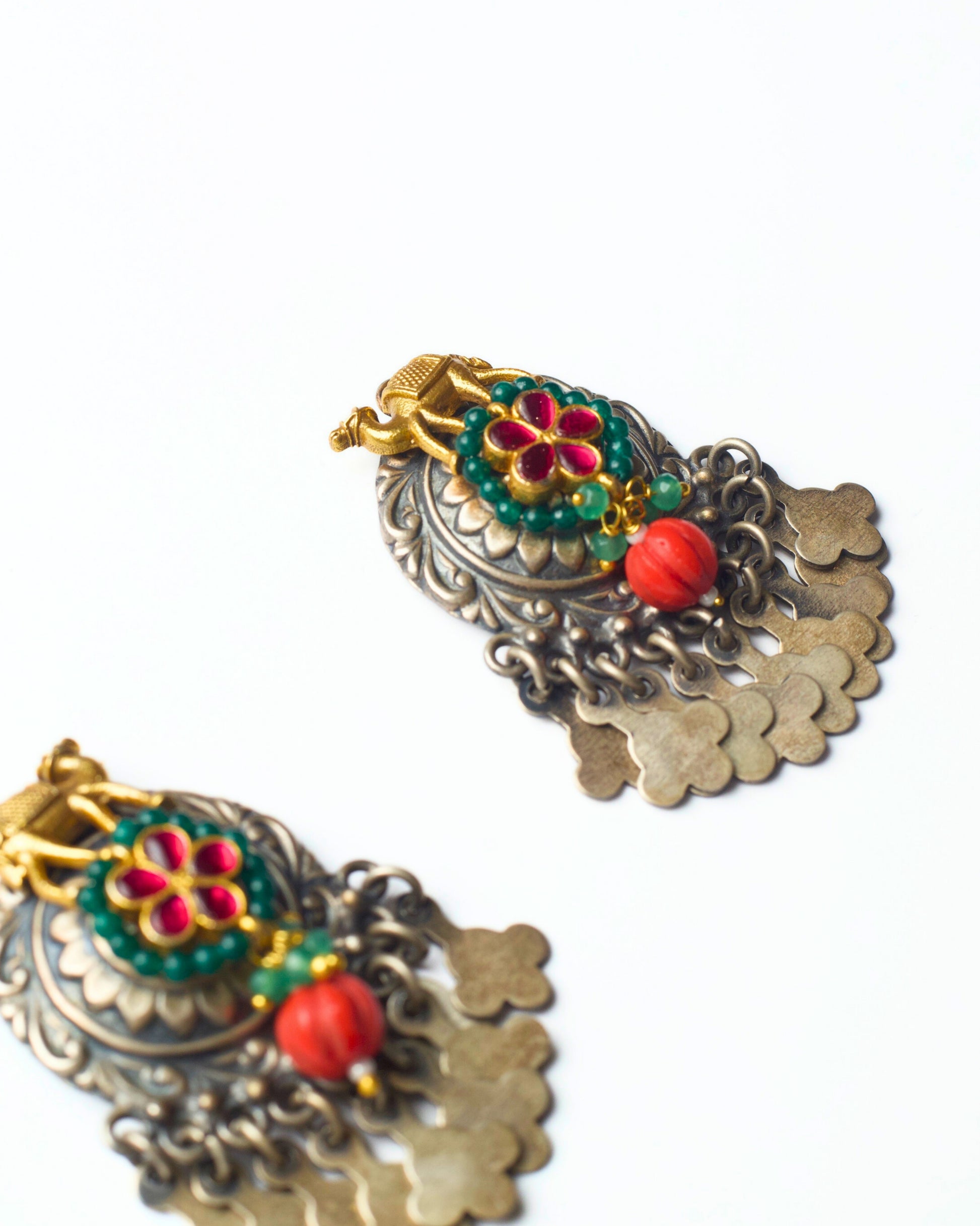 Handcrafted silver camel earrings with floral stone cluster