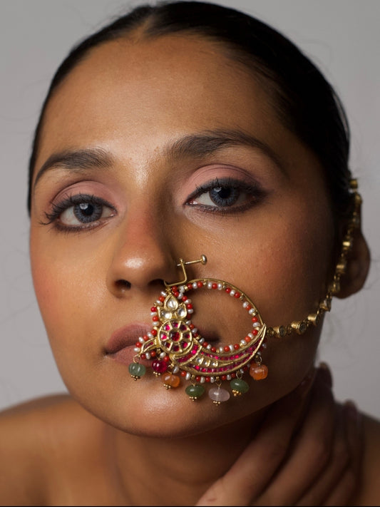 Model wearing The Rasa Nath – 92.5 silver gold-plated non-pierced nath with enamel, pearls, and colorful gemstone drops